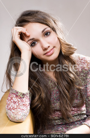 To use this stock image in your creative project, please select the size you need over to the right and click the "Add to Cart" button.
Your downloaded image will come with the Cutcaster watermark removed so don’t worry about the watermark you see on this page. Friendly young brunette teen. stock photo, Portrait of a beautiful friendly young brunette teen girl. by exvivo