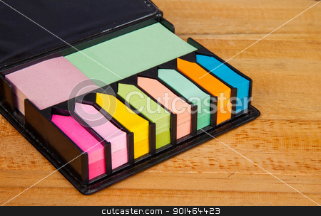 To use this stock image in your creative project, please select the size you need over to the right and click the "Add to Cart" button.
Your downloaded image will come with the Cutcaster watermark removed so don’t worry about the watermark you see on this page. Multicolored post it note block in black leather case stock photo, Multicolored post it note block in black leather case on wood table by Yuttasak Jannarong