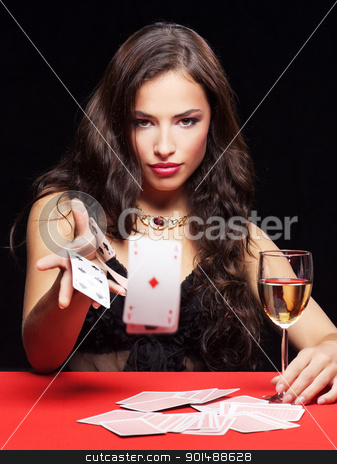 Woman gambling on red table woman gambling on red table stock photo, pretty young woman gambling on red table by iMarin