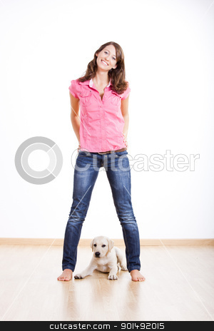 Girl and her best friend Girl and her best friend stock photo, Beautiful young woman with a cute puppy under her legs by ikostudio