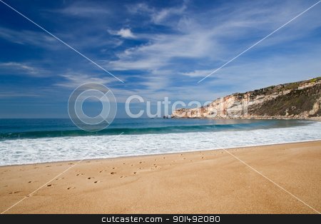 To use this stock image in your creative project, please select the size you need over to the right and click the "Add to Cart" button.
Your downloaded image will come with the Cutcaster watermark removed so don’t worry about the watermark you see on this page. Beautiful beach stock photo, Landscape picture of the beautiful beach from Nazare, Portugal by ikostudio