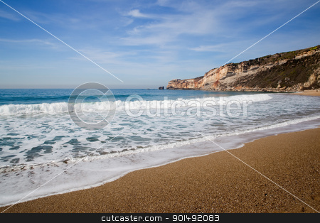 To use this stock image in your creative project, please select the size you need over to the right and click the "Add to Cart" button.
Your downloaded image will come with the Cutcaster watermark removed so don’t worry about the watermark you see on this page. Beautiful beach stock photo, Landscape picture of the beautiful beach from Nazare, Portugal by ikostudio