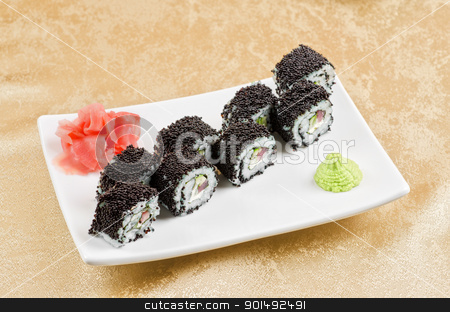 Tuna sushi roll tuna sushi roll stock photo, sushi roll with tuna, avacado, sauce and flying fish roe by olinchuk