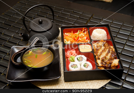 To use this stock image in your creative project, please select the size you need over to the right and click the "Add to Cart" button.
Your downloaded image will come with the Cutcaster watermark removed so don’t worry about the watermark you see on this page. Sushi lunch stock photo, Sushi lunch with soup salad tea and sauce by olinchuk