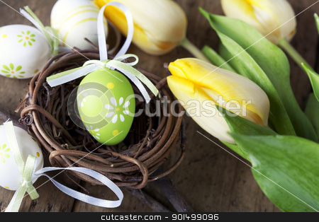 To use this stock image in your creative project, please select the size you need over to the right and click the "Add to Cart" button.
Your downloaded image will come with the Cutcaster watermark removed so don’t worry about the watermark you see on this page. easter eggs with yellow tulip flowers stock photo, easter eggs with yellow tulip flowers isolated on wooden board by klenova