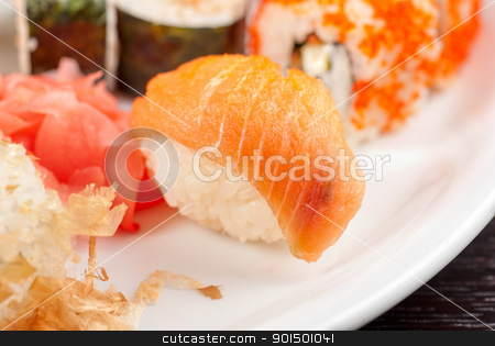 To use this stock image in your creative project, please select the size you need over to the right and click the "Add to Cart" button.
Your downloaded image will come with the Cutcaster watermark removed so don’t worry about the watermark you see on this page. sushi set stock photo, closeup photo of japanese sushi set dish by olinchuk