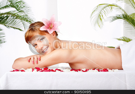 To use this stock image in your creative project, please select the size you need over to the right and click the "Add to Cart" button.
Your downloaded image will come with the Cutcaster watermark removed so don’t worry about the watermark you see on this page. spa treatment in salon stock photo, Pretty woman with flower in her hair, waiting for spa, massage treatment by iMarin