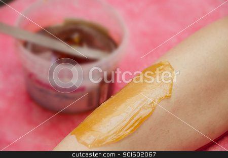 Sugaring epilation sugaring epilation stock photo, Sugaring: epilation with liquate sugar at legs. It is less painful hair removal with wax replacement by olinchuk