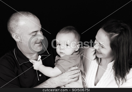 Family Family stock photo, Father holding his baby boy, mother looking on by Vanessa Van Rensburg