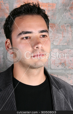 Male model stock photo, Male model against a rough brick wall background by ... Male model stock photo, Male model against a rough brick wall background by ...