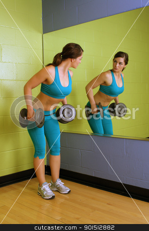 To use this stock image in your creative project, please select the size you need over to the right and click the "Add to Cart" button.
Your downloaded image will come with the Cutcaster watermark removed so don’t worry about the watermark you see on this page. Beautiful Woman with Hand Weights (2) stock photo, A lovely young brunette with exceptional muscle tone works out with hand weights in front of a mirror. by Carl Stewart