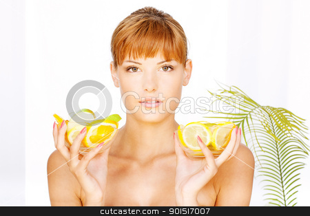 To use this stock image in your creative project, please select the size you need over to the right and click the "Add to Cart" button.
Your downloaded image will come with the Cutcaster watermark removed so don’t worry about the watermark you see on this page. girl with two bowl full of fruit stock photo, Portrait of a pretty brunette girl with two bowl full of fruit in her hands in a spa salon by iMarin