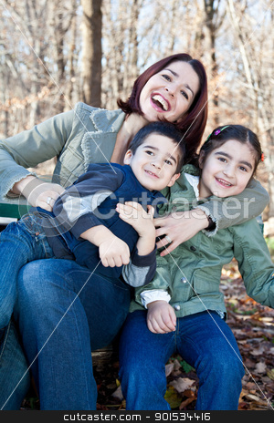 To use this stock image in your creative project, please select the size you need over to the right and click the "Add to Cart" button.
Your downloaded image will come with the Cutcaster watermark removed so don’t worry about the watermark you see on this page. Laughing Mother Hugging Her Children stock photo, Family portrait of a happy laughing mother hugging smiling boy and girl. by Dasha Rosato