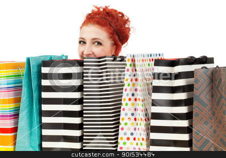 To use this stock image in your creative project, please select the size you need over to the right and click the "Add to Cart" button.
Your downloaded image will come with the Cutcaster watermark removed so don’t worry about the watermark you see on this page. Peeking over her shopping bags stock photo, Photo of a beautiful redhead peeking over her shopping bags. by © Ron Sumners