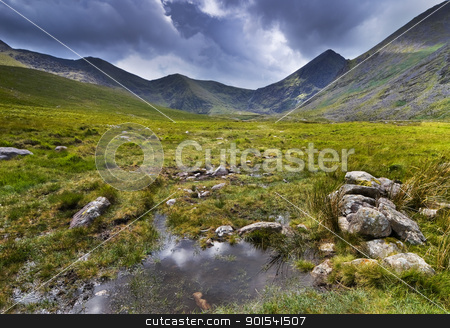 To use this stock image in your creative project, please select the size you need over to the right and click the "Add to Cart" button.
Your downloaded image will come with the Cutcaster watermark removed so don’t worry about the watermark you see on this page. Mountain landscape stock photo, Mountain landscape shot during rainy weather. Macgillycuddy's Reeks, Iveragh Peninsula, Ireland by Tiramisu Studio