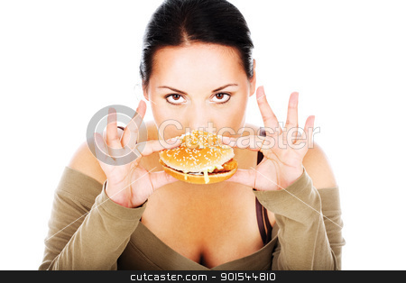 To use this stock image in your creative project, please select the size you need over to the right and click the "Add to Cart" button.
Your downloaded image will come with the Cutcaster watermark removed so don’t worry about the watermark you see on this page. chubby girl and fast food stock photo, Cute chubby eating a hamburger, isolated on white by iMarin