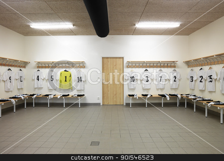 To use this stock image in your creative project, please select the size you need over to the right and click the "Add to Cart" button.
Your downloaded image will come with the Cutcaster watermark removed so don’t worry about the watermark you see on this page. Dressing room stock photo, Soccer teams dressing room with numbered shirts by Anne-Louise Quarfoth
