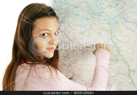 Teenage girl pointing at map Teenage girl pointing at map stock photo, happy caucasian longhaired teenage girl pointing at map by Julija Sapic