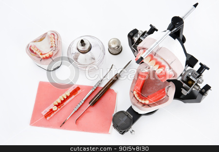 To use this stock image in your creative project, please select the size you need over to the right and click the "Add to Cart" button.
Your downloaded image will come with the Cutcaster watermark removed so don’t worry about the watermark you see on this page. Dental lab articulator and equipments for denture stock photo, Dental lab articulator and equipments for denture by pixs4u