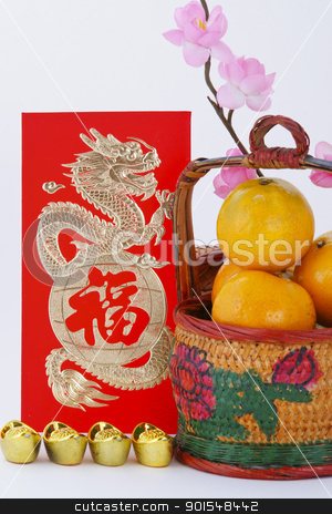 Chinese new year decoration Chinese new year decoration stock photo, Basket of Oranges with Gold ingots and blessing word, focus at the word by pixs4u