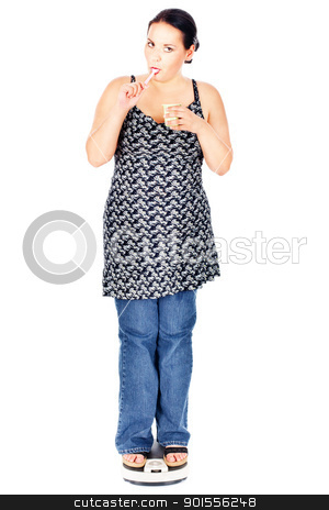 Chubby woman eating on scale chubby woman eating on scale stock photo, chubby woman on the scale eating a yogurt, isolate on white by iMarin