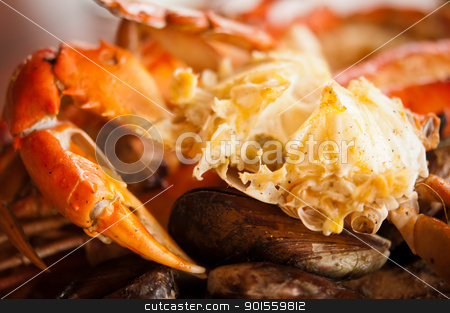 To use this stock image in your creative project, please select the size you need over to the right and click the "Add to Cart" button.
Your downloaded image will come with the Cutcaster watermark removed so don’t worry about the watermark you see on this page. Dish with crab and mussels stock photo, Dish with crab and mussels. Selective focus on the claw by Iryna Rasko