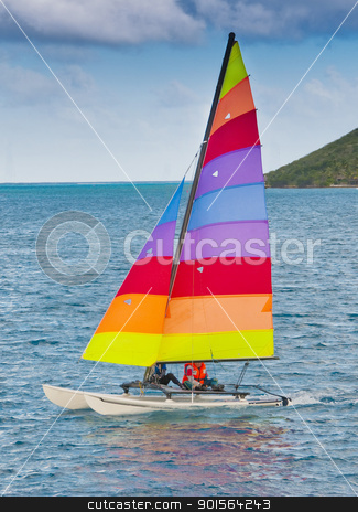 Small catamaran sailboat Small catamaran sailboat stock photo, Small catamaran sailboat in the caribbean by Christian Delbert