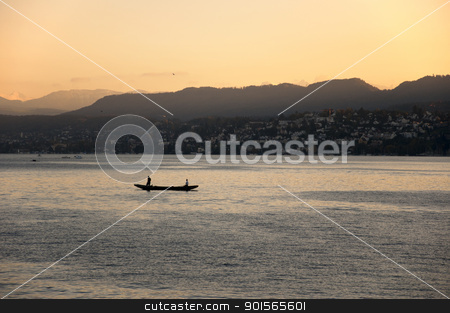 Sunset river mountain Sunset river mountain stock photo, Boat in lake during sunset. Mountains in the background. by jmffotos