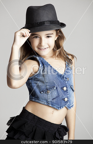 Fashion little girl Fashion little girl stock photo, Fashion portrait of a little girl looking at the camera, over a gray background by ikostudio