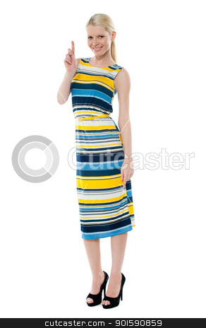 To use this stock image in your creative project, please select the size you need over to the right and click the "Add to Cart" button.
Your downloaded image will come with the Cutcaster watermark removed so don’t worry about the watermark you see on this page. Attractive girl posing in style and pointing upwards stock photo, Attractive girl posing in style and pointing upwards on white background by Ishay Botbol