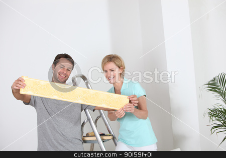 To use this stock image in your creative project, please select the size you need over to the right and click the "Add to Cart" button.
Your downloaded image will come with the Cutcaster watermark removed so don’t worry about the watermark you see on this page. Couple decorating stock photo, Couple decorating by photography33