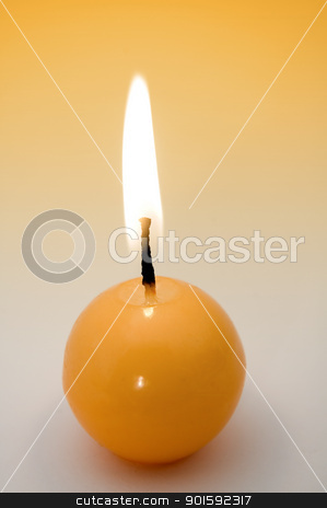 Candle candle stock photo, small yellow burning candle, yellow to grey background by Robert Remen