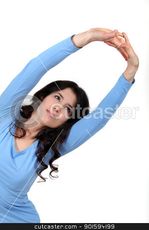 To use this stock image in your creative project, please select the size you need over to the right and click the "Add to Cart" button.
Your downloaded image will come with the Cutcaster watermark removed so don’t worry about the watermark you see on this page. Female model stretching. stock photo, Female model stretching. by photography33