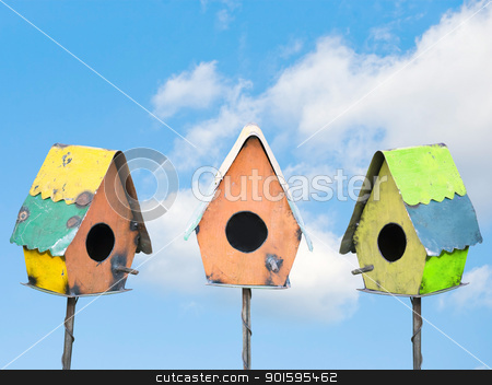 To use this stock image in your creative project, please select the size you need over to the right and click the "Add to Cart" button.
Your downloaded image will come with the Cutcaster watermark removed so don’t worry about the watermark you see on this page. Bird Houses under a Blue Sky stock photo, Three colorful bird houses under a sunny blue sky by Leslie Murray