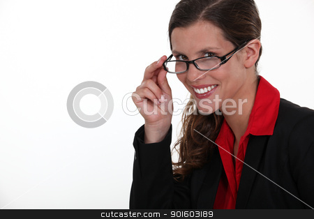 A portrait of businesswoman adjusting her glasses. A portrait of businesswoman adjusting her glasses. stock photo, A portrait of businesswoman adjusting her glasses. by photography33