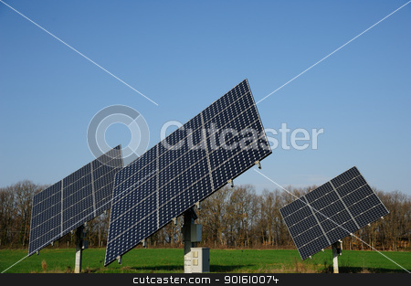 Solar panels Solar panels stock photo, A group of solar panels in the green by Maurizio Martini