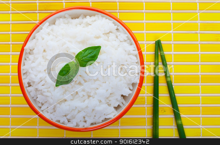 Steamed rice Steamed rice stock photo, Bowl of steamed rice on yellow with green bamboo chopsticks by Steve Mcsweeny