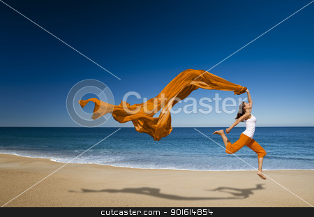 To use this stock image in your creative project, please select the size you need over to the right and click the "Add to Cart" button.
Your downloaded image will come with the Cutcaster watermark removed so don’t worry about the watermark you see on this page. Jumping stock photo, Beautiful young woman jumping on the beach with a colored tissue by ikostudio