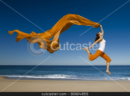 Jumping Jumping stock photo, Beautiful young woman jumping on the beach with a colored tissue by ikostudio