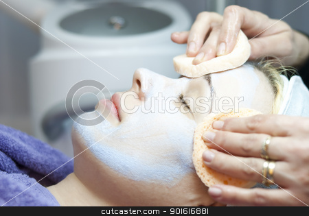 To use this stock image in your creative project, please select the size you need over to the right and click the "Add to Cart" button.
Your downloaded image will come with the Cutcaster watermark removed so don’t worry about the watermark you see on this page. Young woman with clay facial mask stock photo, Beautiful young woman lies on a table in a beauty spa getting a treatment by Jenella