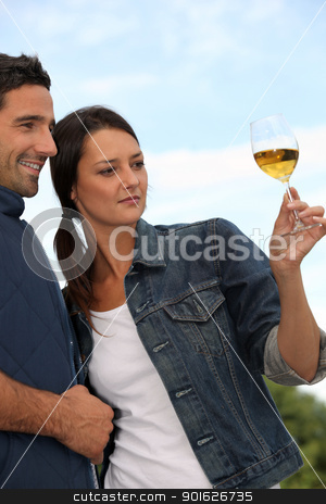 To use this stock image in your creative project, please select the size you need over to the right and click the "Add to Cart" button.
Your downloaded image will come with the Cutcaster watermark removed so don’t worry about the watermark you see on this page. Couple tasting wine in field stock photo, Couple tasting wine in field by photography33
