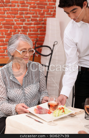To use this stock image in your creative project, please select the size you need over to the right and click the "Add to Cart" button.
Your downloaded image will come with the Cutcaster watermark removed so don’t worry about the watermark you see on this page. Young waiter serving lunch to an older customer stock photo, Young waiter serving lunch to an older customer by photography33