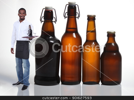 To use this stock image in your creative project, please select the size you need over to the right and click the "Add to Cart" button.
Your downloaded image will come with the Cutcaster watermark removed so don’t worry about the watermark you see on this page. Waiter with beer bottles stock photo, Waiter with beer bottles by photography33