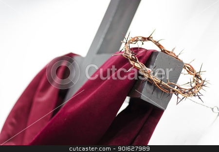 To use this stock image in your creative project, please select the size you need over to the right and click the "Add to Cart" button.
Your downloaded image will come with the Cutcaster watermark removed so don’t worry about the watermark you see on this page. Cross and crown stock photo, Crown of thorns hung around the Easter cross by manaemedia