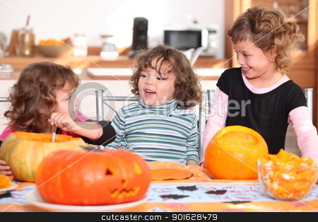Three sisters carving pumpkins. Three sisters carving pumpkins. stock photo, Three sisters carving pumpkins. by photography33