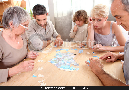 To use this stock image in your creative project, please select the size you need over to the right and click the "Add to Cart" button.
Your downloaded image will come with the Cutcaster watermark removed so don’t worry about the watermark you see on this page. Family making puzzle stock photo, Family making puzzle by photography33
