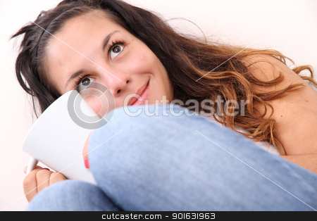A young Girl drinking Coffee A young Girl drinking Coffee stock photo, A young Girl drinking coffee. by Michael Osterrieder