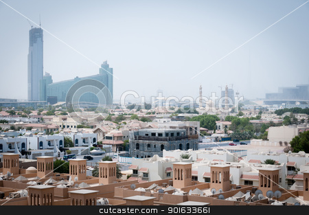 Dubai covered by sand haze Dubai covered by sand haze stock photo, Dubai, UAE - August 29, 2011: The city covered by sand haze with skyscrapers and mosque on background and private buildings on the front. by Iryna Rasko