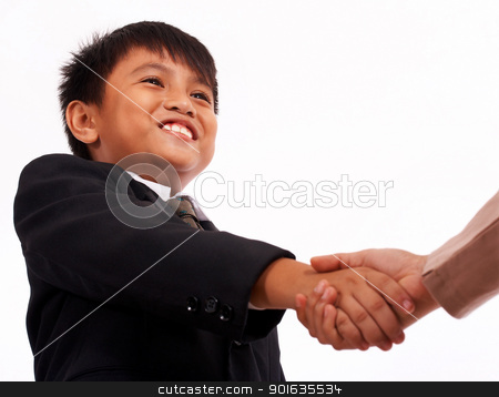 To use this stock image in your creative project, please select the size you need over to the right and click the "Add to Cart" button.
Your downloaded image will come with the Cutcaster watermark removed so don’t worry about the watermark you see on this page. Formal Boy Shaking Hands With An Adult stock photo, Boy In A Formal Suit Shaking Hands With Someone by stuartmiles