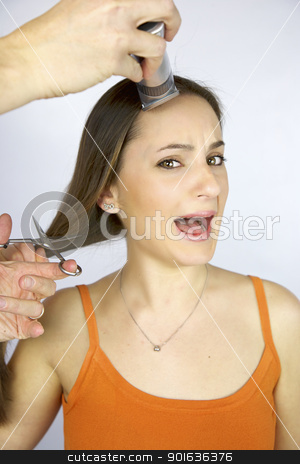 To use this stock image in your creative project, please select the size you need over to the right and click the "Add to Cart" button.
Your downloaded image will come with the Cutcaster watermark removed so don’t worry about the watermark you see on this page. Girl screaming getting hair cut and shaved stock photo, Girl screaming getting hair cut and shaved with scissors and razor by federico marsicano
